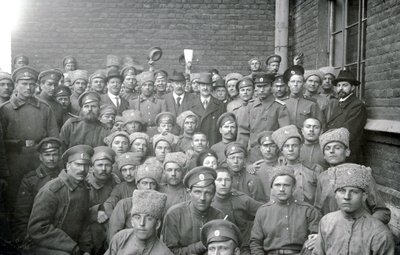 Soldiers of the Volinsky unit with non-commissioned officer T. L. Kirpichnikov and representatives of workers associations of England, St Petersburg, February 1917 by Russian Photographer